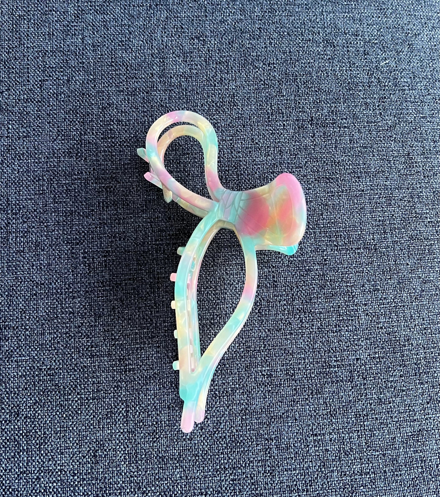 Pince à griffes en forme de nœud en bonbon